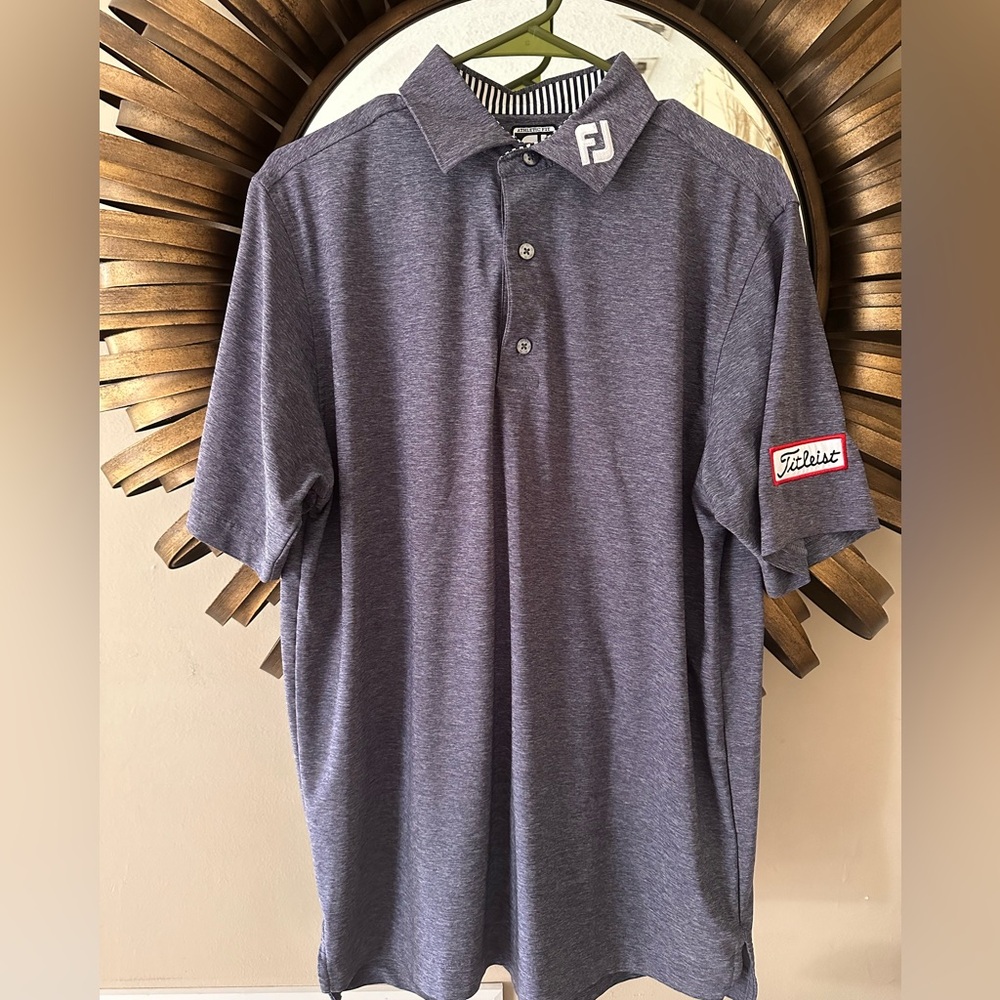 Navy blue FootJoy golf button down shirt with Titleist logo